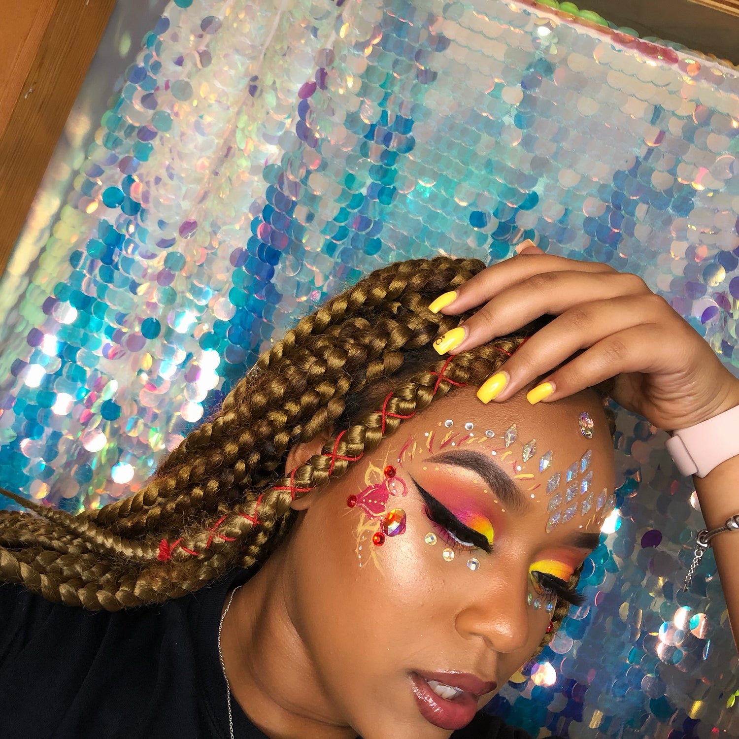 Festival/carnival makeup with face gems